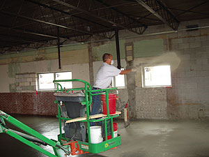 Spreading Color Hardener with a Boom Lift