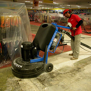 Omega grinder for decorative concrete floors